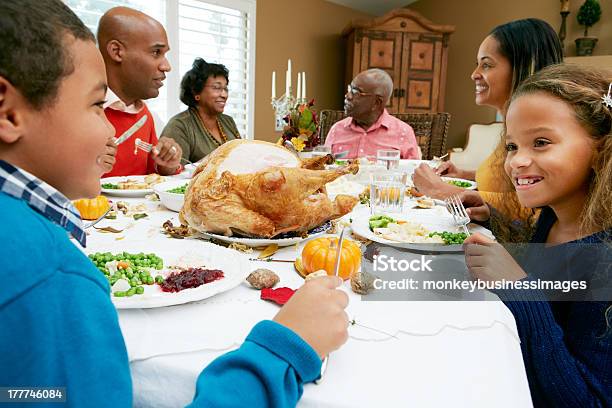 Multi Generation Family Celebrating Thanksgiving Stock Photo - Download Image Now - Thanksgiving - Holiday, Family, Dinner