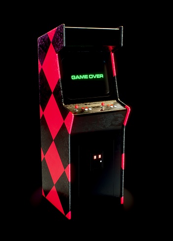 retro arcade with game over on screen
