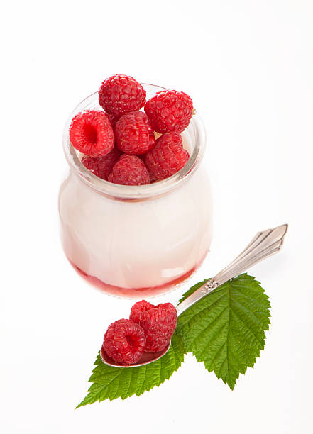 istock Fresh Yogurt in a jar with Raspberries, leaves 177746714