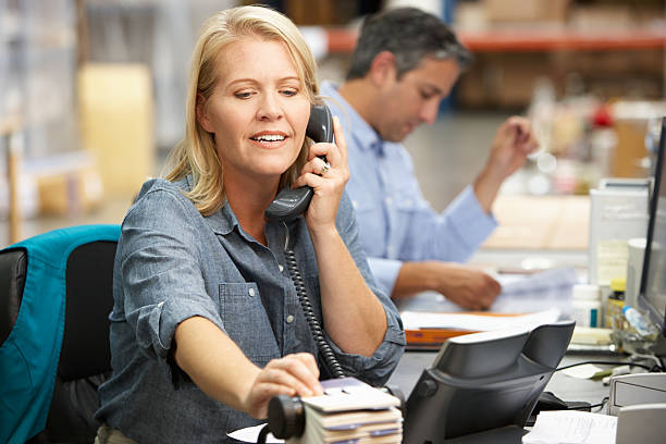 istock Businesswoman Working At Desk In Warehouse 177747177