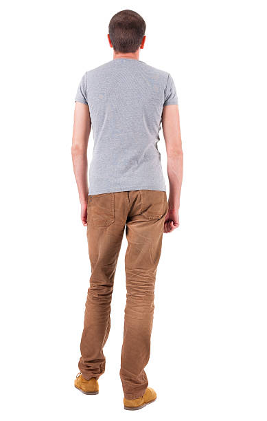 istock Back view  man in gray shirt and jeans looking up 177747550