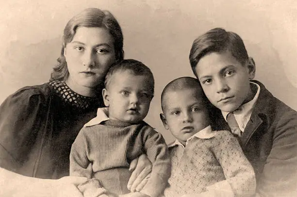 A vintage photo portrait from 1916 of Russian family.