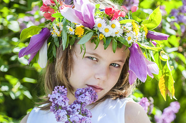istock girl with a wreath 177749798