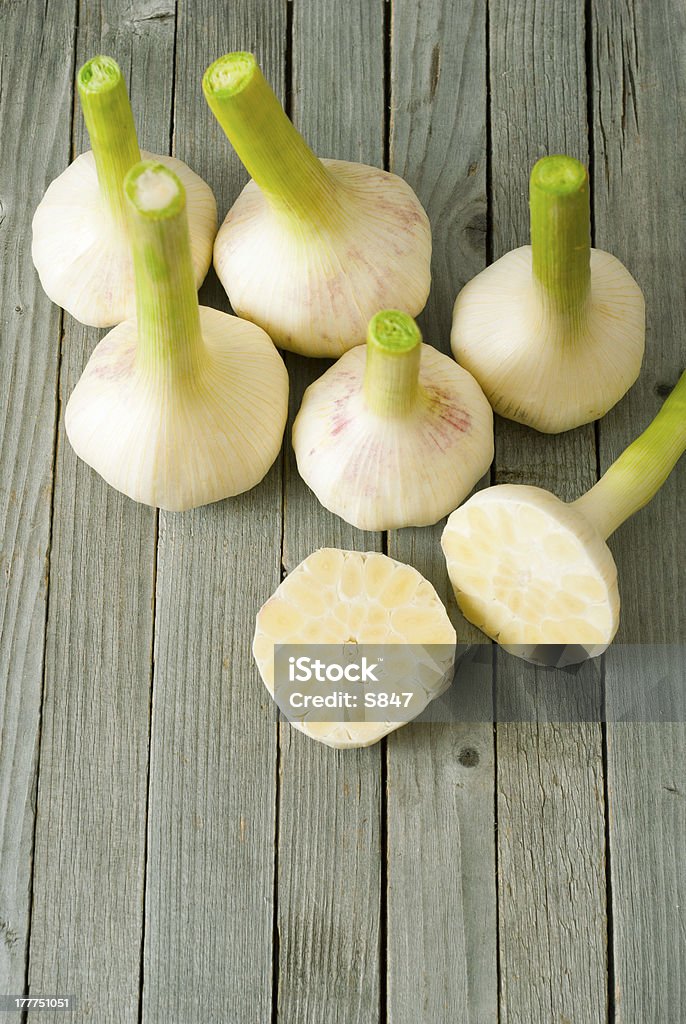 Garlics - Foto stock royalty-free di Aglio - Alliacee