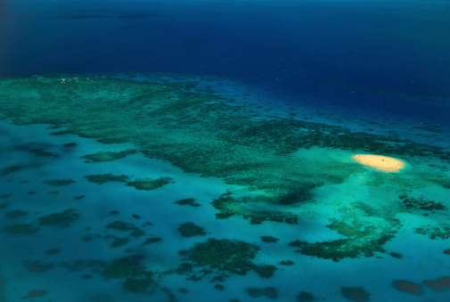Upolu Cay Island in the Great Barrier Reef Marine Park Australia highlighted among the individual reefs underwater