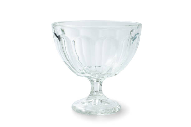 istock Empty clear ice cream sundae cup, sundae glass, or dessert bowl isolated on white background, clipping path. Vanilla sundae ice cream, crystal cup, transparent design for icecream shop. 1777521773