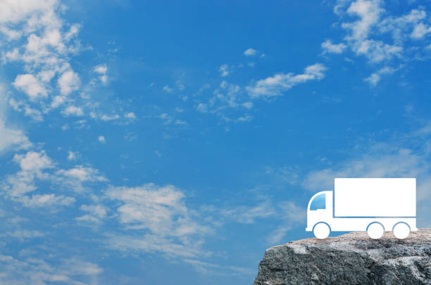 Truck icon on rock mountain over blue sky with white clouds, Business transportation service concept