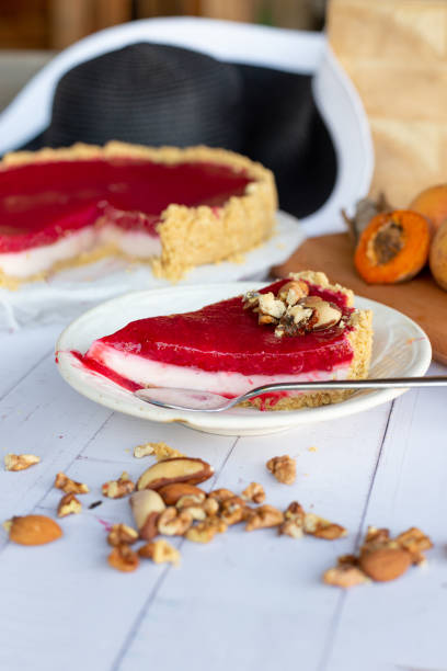 istock red pie with cherries and apricots, on a wooden background 1777524920