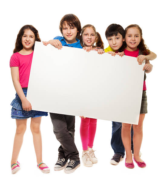 istock Group of schoolchildren holding white board 177752893