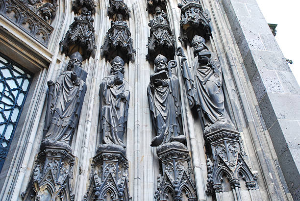 istock sculpture under gate of Cologne cathedral 177754124