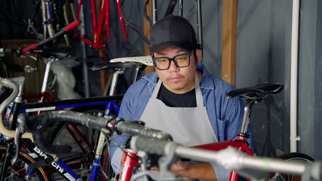 A middle aged man owned a bicycle shop. Bicycle shops are small businesses in the city.