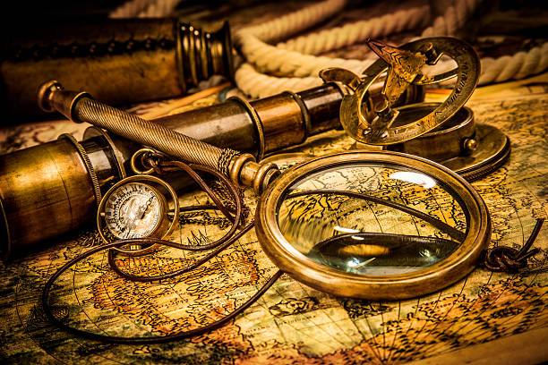 istock Vintage magnifying glass lies on an ancient world map 177754642