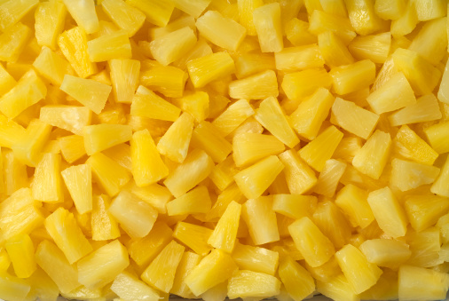 background of yellow pineapple chunks