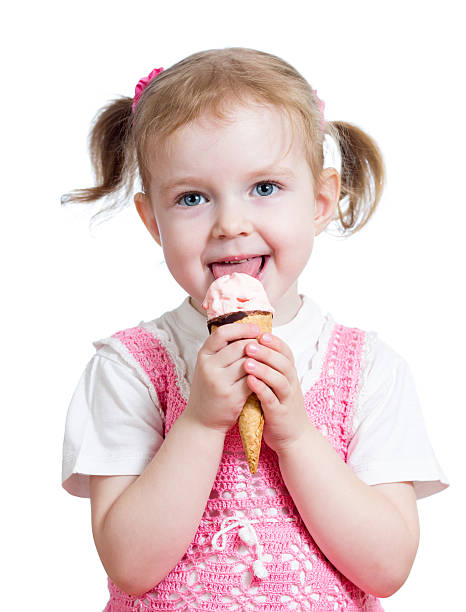 istock happy kid girl eating ice cream in studio 177754813