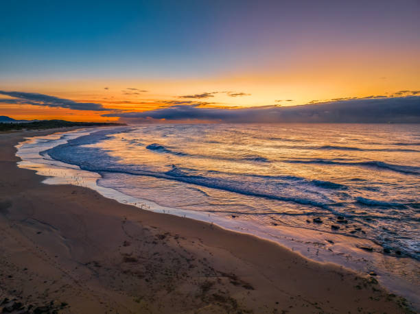 istock Sunrise seascape with waves 1777551081