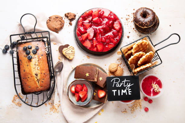 istock Table with various cookies, donuts and cakes. Holiday concept. 1777551104