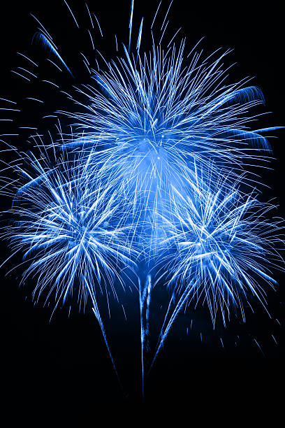 Fireworks in the night sky stock photo