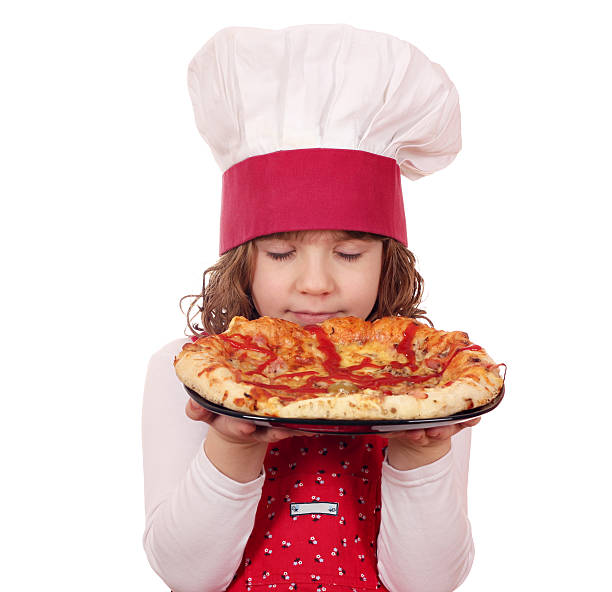 istock little girl cook smells pizza 177756660