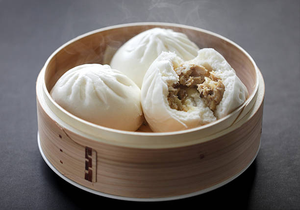 steamed pork buns stock photo