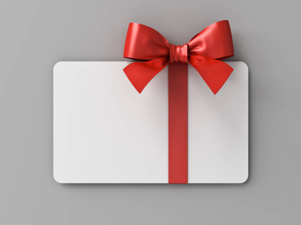 istock Blank 3d white gift card or gift voucher with red ribbon and bow isolated on grey wall background with shadow minimal conceptual 3D rendering 1777569326