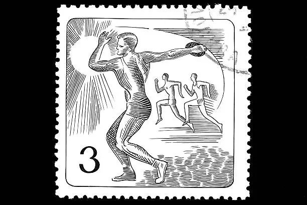 Discus thrower on a postage stamp. Black and white engraving