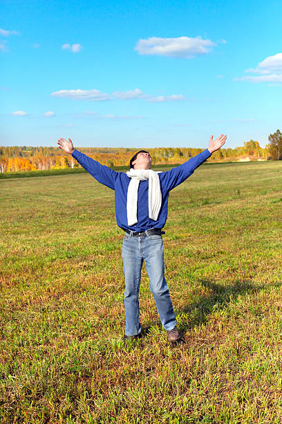 istock young man in the field 177758859