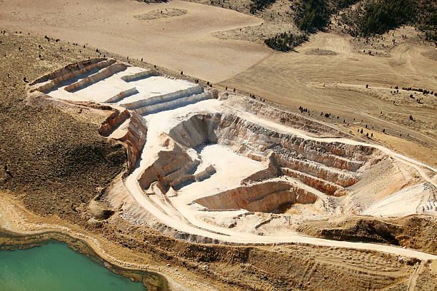 Aerial view of phosphate mine near water stock photo