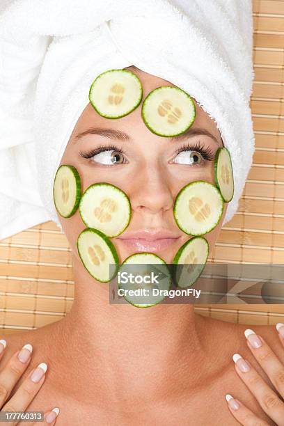 Woman With Facial Mask Of Cucumber Stock Photo - Download Image Now - One Woman Only, Women, 20-24 Years