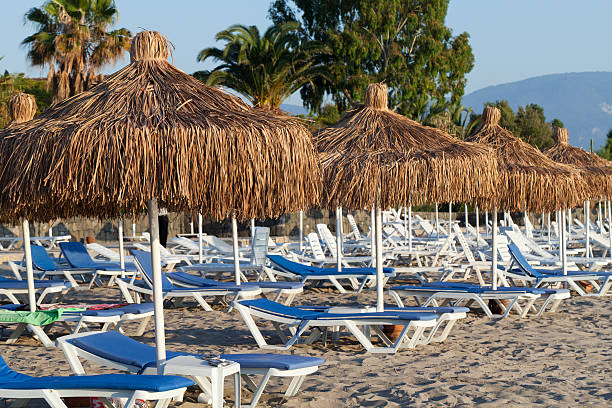 istock Beach loungers and umbrellas 177760377