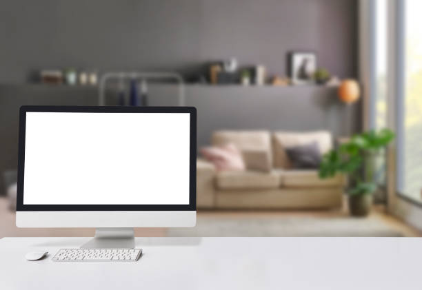 istock Close up computer screen on the white table style and blue grey living room background. 1777605969