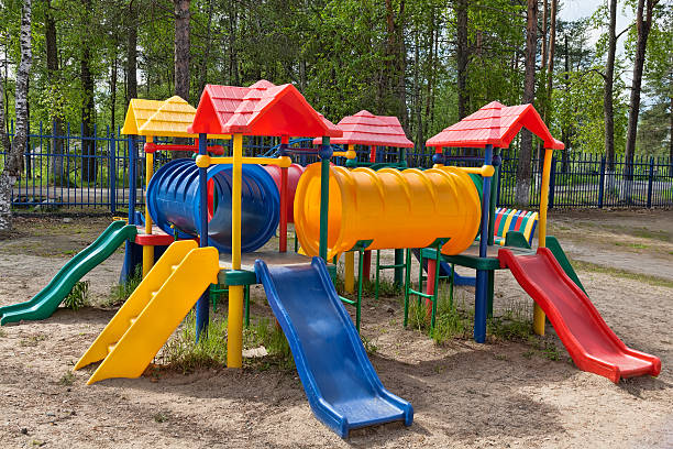 istock Children colorful playground in park 177760734