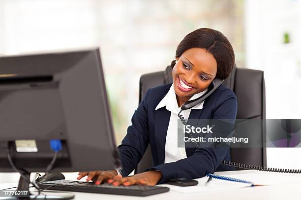 Young African American Businesswoman Working Stock Photo - Download Image Now - African Ethnicity, Office, Telephone