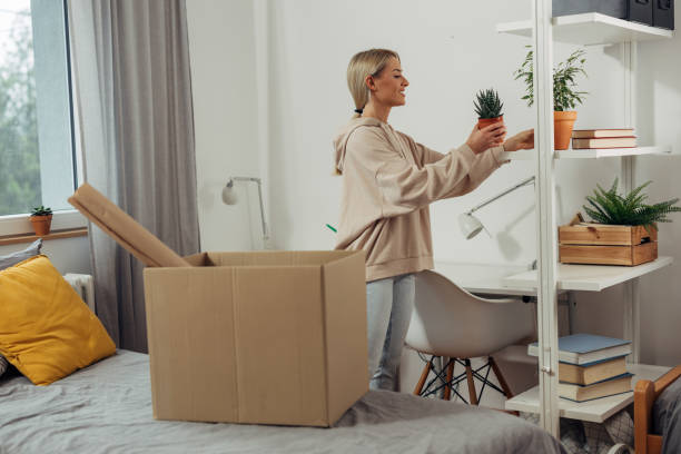female student in dorm room