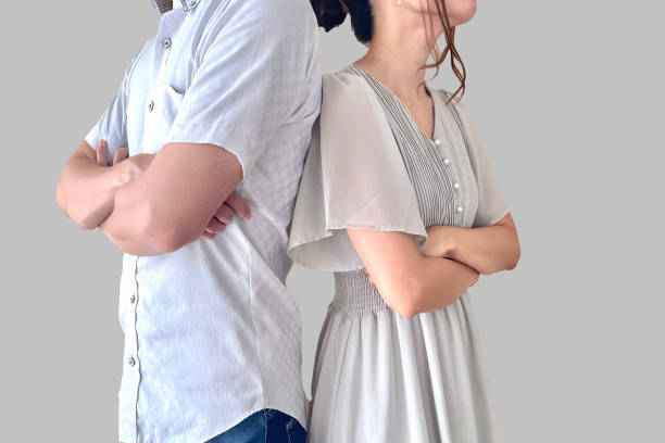 Young couple fighting with their backs turned