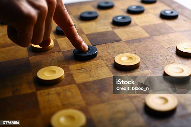 Checkers Game Stock Photo - Download Image Now - Checkers, Leisure Games, Playing