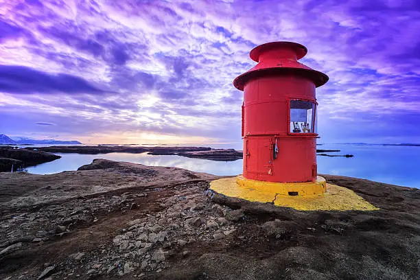 Small red lighthouse in Stykkisholmur, Iceland