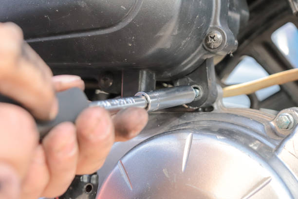 istock Close-up Of Hands With A Screwdriver motorcycle 1777642413