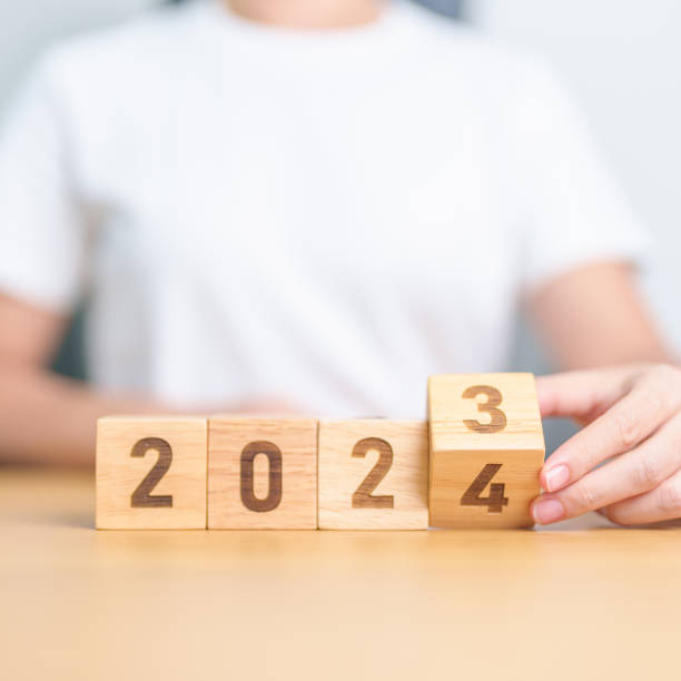 istock 2023 change to 2024 year block on table. goal, Resolution, strategy, plan, start, budget, mission, action, motivation and New Year concepts 1777645529