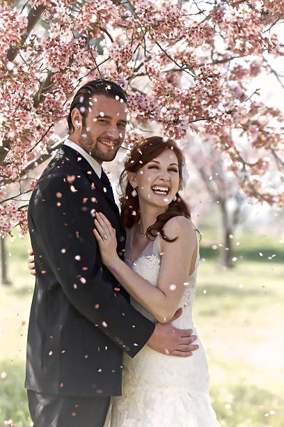 istock Couple Showered with Cherry Blossoms 177764553