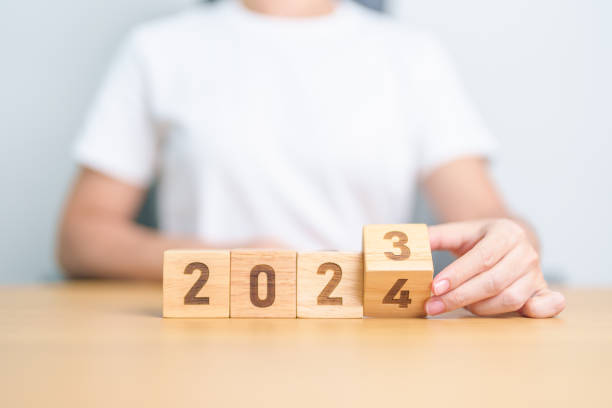 istock 2023 change to 2024 year block on table. goal, Resolution, strategy, plan, start, budget, mission, action, motivation and New Year concepts 1777645537