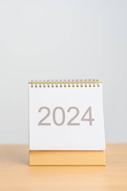 istock 2024 Year Calendar on table background. Happy New Year, Resolution, Goals, Plan,  Action, Mission and financial Concept 1777646588