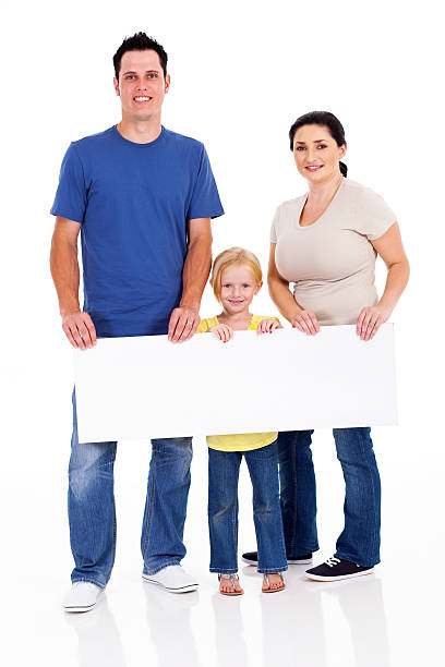 istock happy young family with banner 177764822