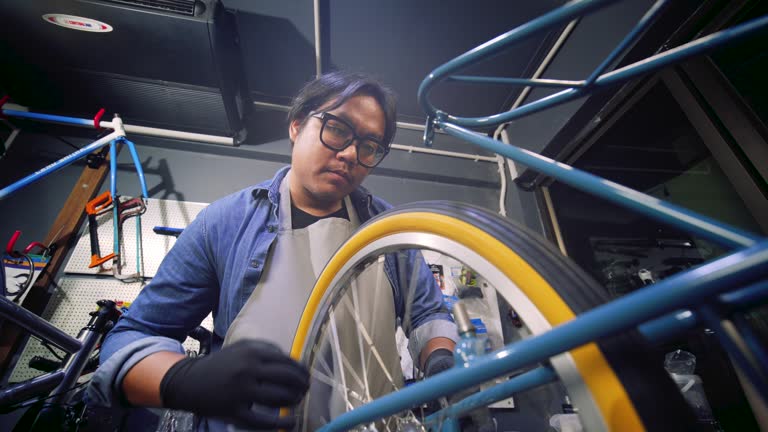 Expert bicycle repairman Repairing and assembling customer's bikes