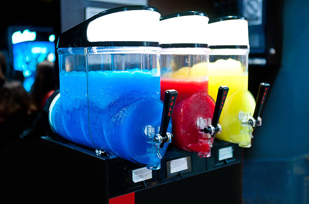 slushy machine machine for making ice slushy drinks with three different tastes ice machines stock pictures, royalty-free photos & images