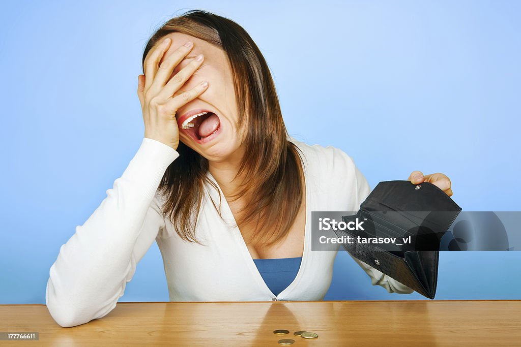 Girl with crying face with empty wallet woman with wallet Crying Stock Photo