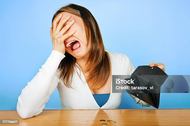 Girl With Crying Face With Empty Wallet Stock Photo - Download Image Now - Crying, Empty Wallet, Currency