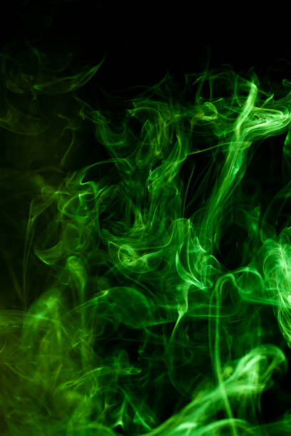 istock Green smoke motion on black background. 1777674603