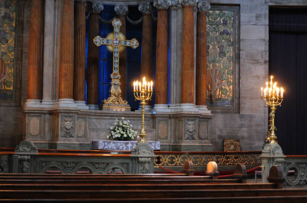 istock Inside of cathedral with cross and candles 177768165
