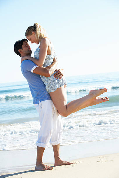 istock Couple enjoying a romantic beach holiday 177768712