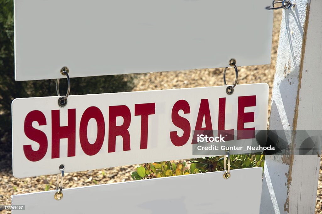 short sale sign short sale sign on pole with copy space Short - Length Stock Photo